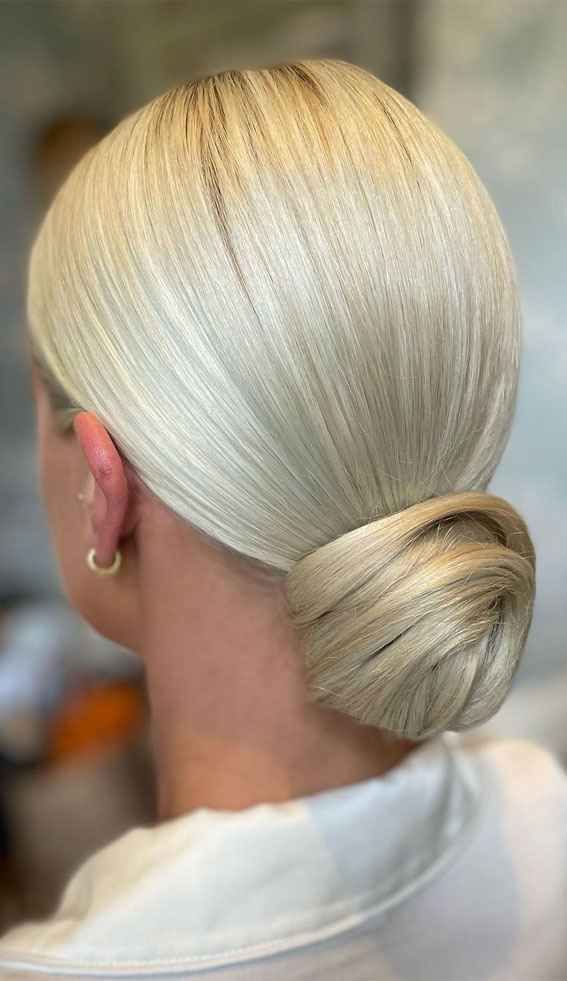50+ Updo Hairstyles That’re So Stylish : Sleek Low Bun Blonde Hair