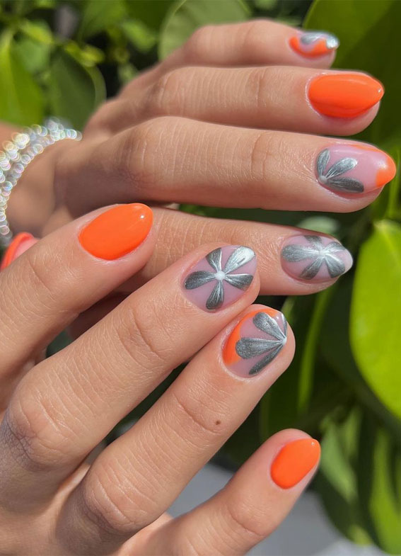 35 Aesthetic Retro Nail Designs For A Spring Mani : Silver Flower + Orange Nails