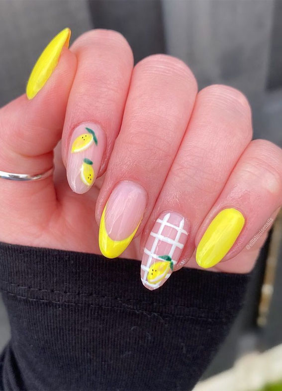 Premium Photo | Female hands with black and yellow nail design yellow nail  polish manicured hands female hands on ye