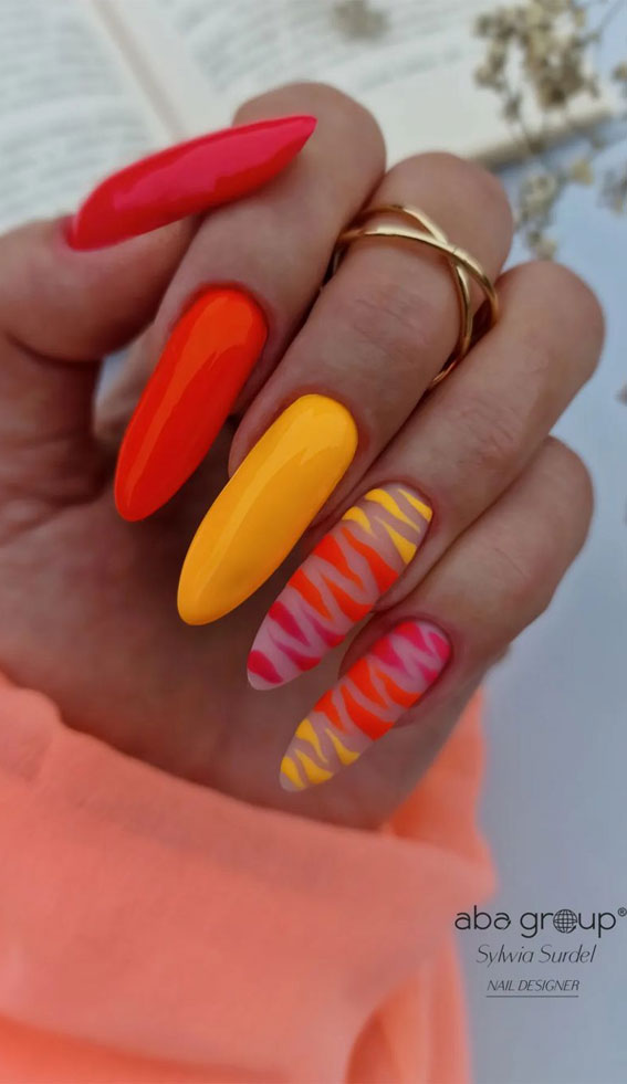 Dive into Summer with Vibrant Nail Art Designs : Bold & Warm Tones