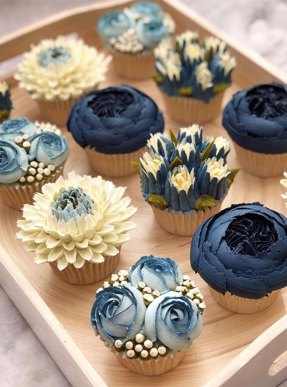42 Heavenly Delights A Collection of Gourmet Cupcakes : Blue buttercream flowers