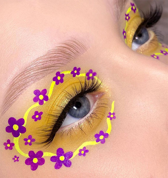 25 Exotic Makeup Looks for a Summer Escape : Purple Flower Yellow Graphic Lines