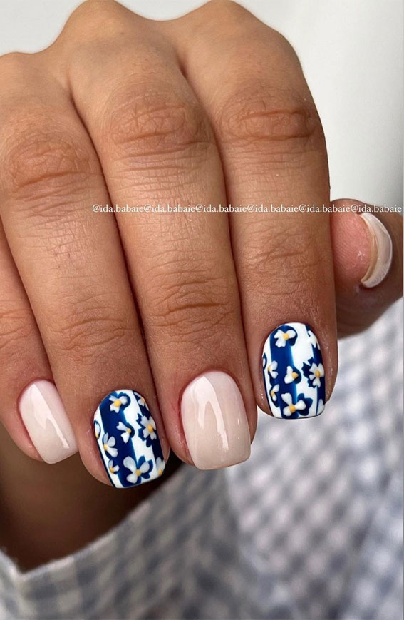 Celebrate Summer With These Cute Nail Art Designs : Half Nude Half Blue with Flower Nails