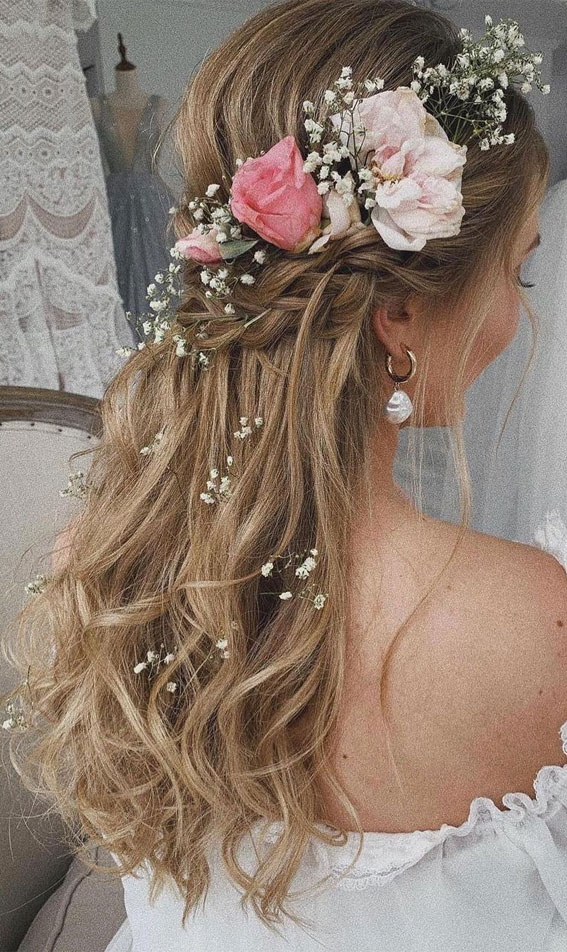 Photo of Engagement hairstyle with flowers in hair