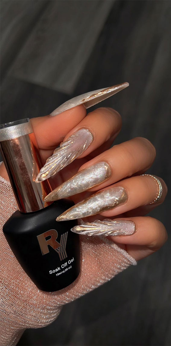 27 Glamorous, Soft, and Subtle Autumn Nail Designs : Shell-Inspired Stiletto Nails