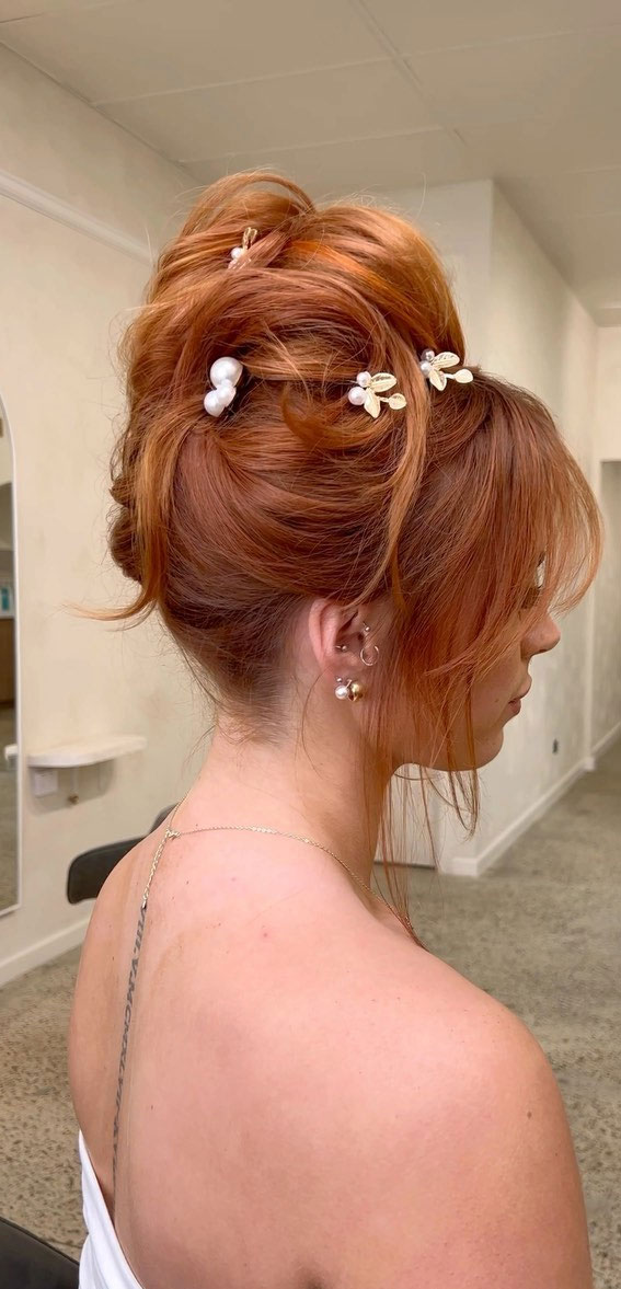 Chic Updos To Elevate Your Hair Game : Copper Messy Twist High Updo