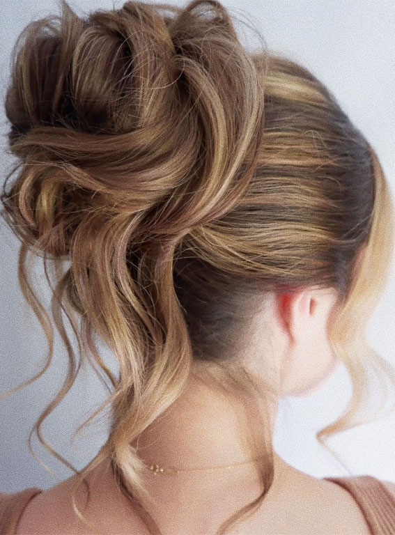 Chic Updos To Elevate Your Hair Game : Carefree Messy High Bun