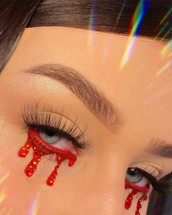 Ghoulish Glam 50+ Spooky Halloween Eye Makeup Ideas : Glittery Red Blood Drip Eye Liner
