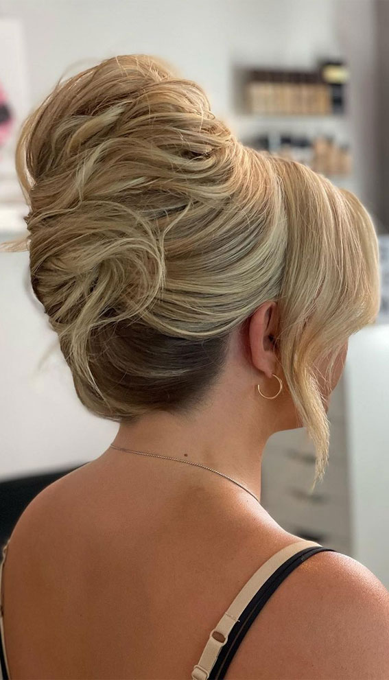 Chic Updos To Elevate Your Hair Game : 90s Inspired High Updo