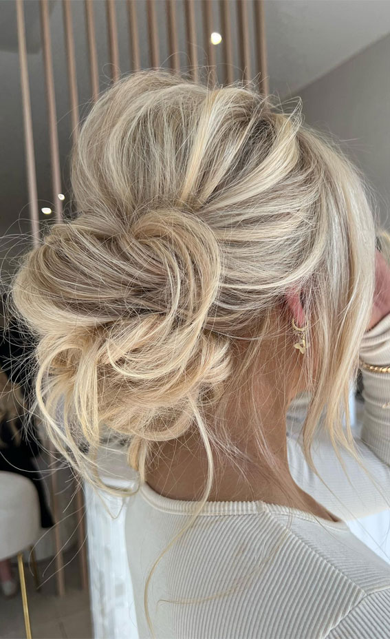 Chic Updos To Elevate Your Hair Game : Timeless Messy Low Bun