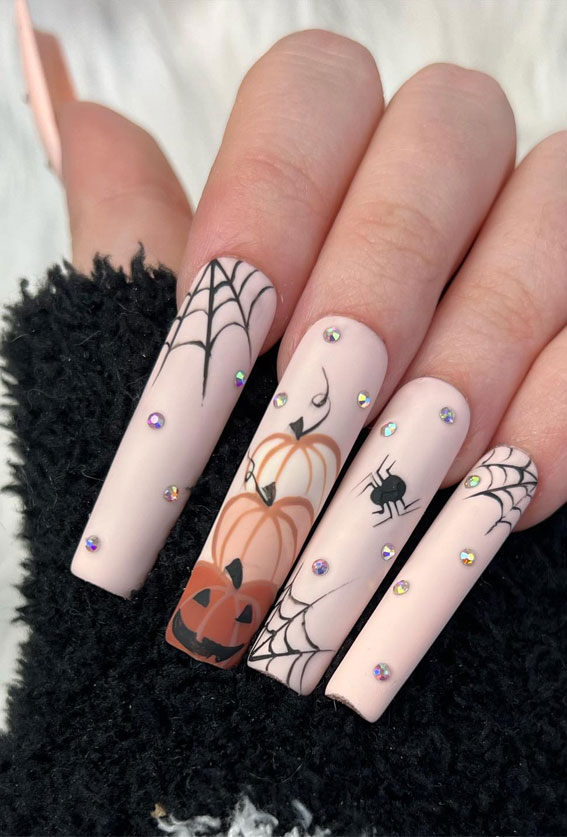 Dazzling Halloween Nails that Turn Heads : Spooky Acrylic Nude Nails