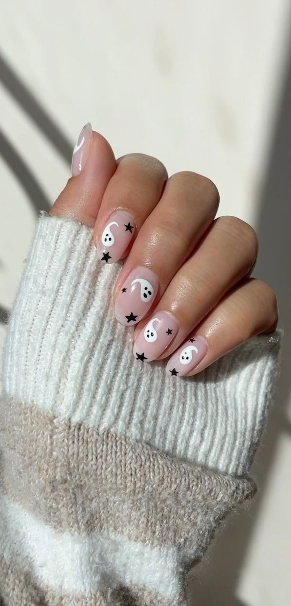 Dazzling Halloween Nails that Turn Heads : Ghosts & Black Stars, Halloween Nails, Halloween nail art, Ghost and black star nails