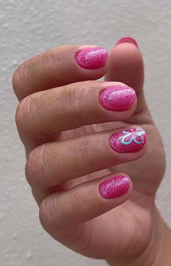 Minimalist Nail Art Ideas That Aren’t Boring : Shimmery Pink Short Nails with Flower