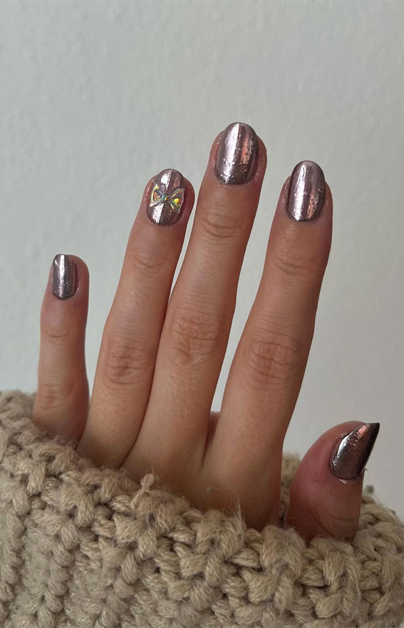 Chrome Elegance 25 Stunning Nail Art Ideas : Reflective Chrome Nails with Bow Details