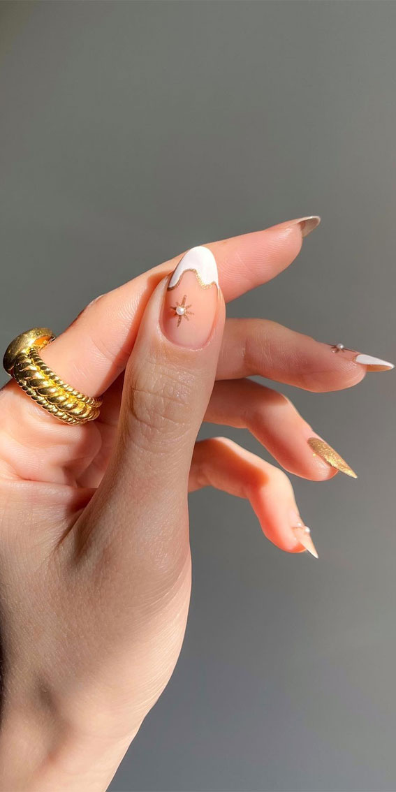 Simple Nail Ideas That’re Perfect for January : Starburst & Abstract White Tips