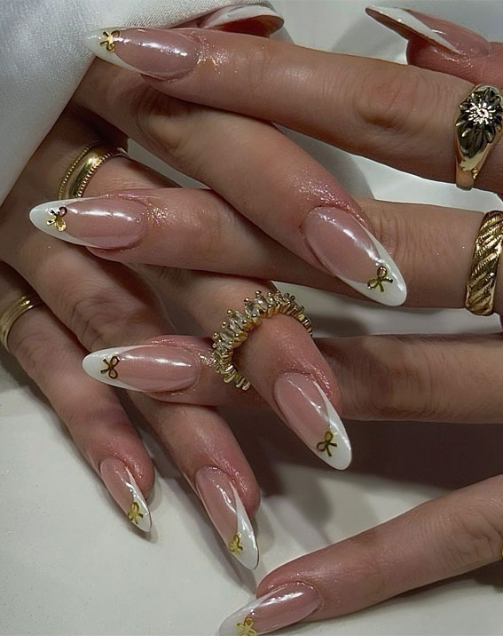 Simple Nail Ideas That’re Perfect For January : White French Tip Nails +Tiny Gold Bows