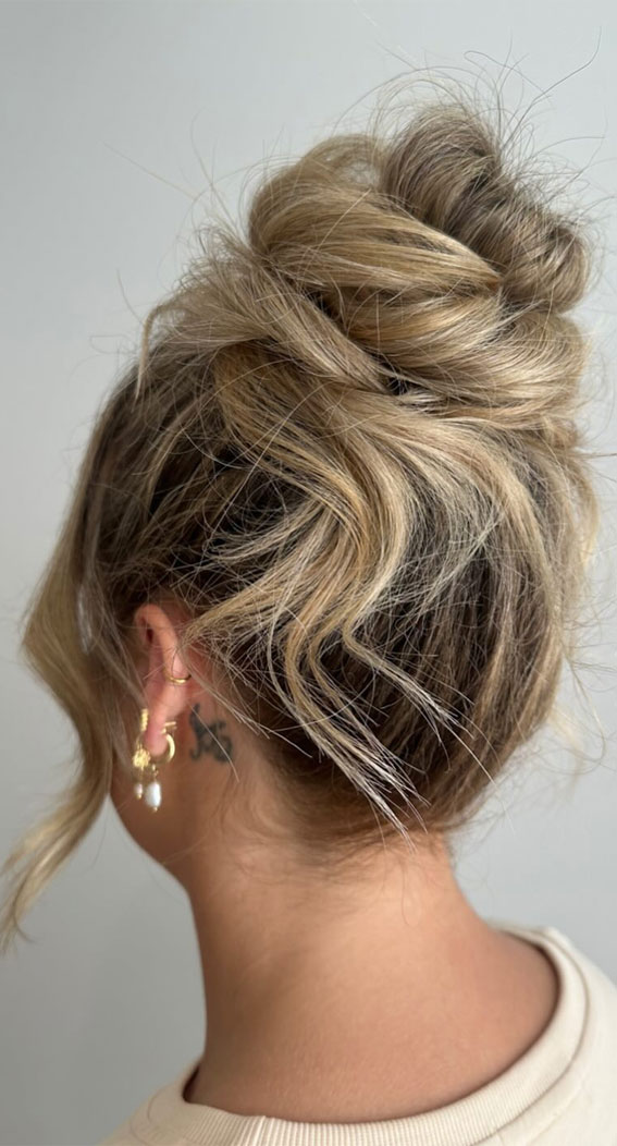Elevate Your Look with Chic Hairstyling Ideas : Undone Waterfall High Bun