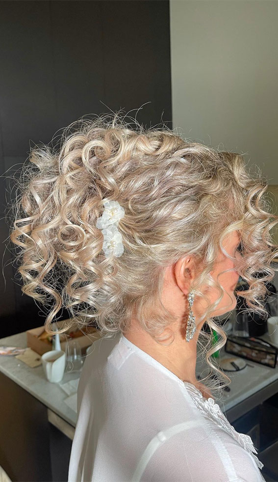 Elevate Your Look with Chic Hairstyling Ideas : Natural Curly Updo