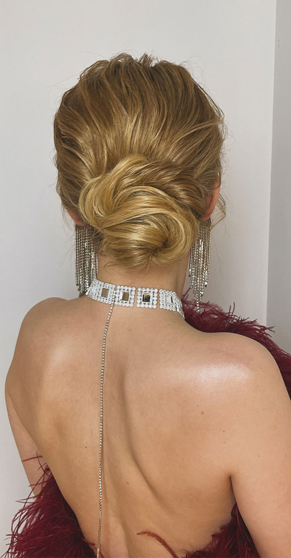 Elevate Your Look with Chic Hairstyling Ideas : A Simple Twist Low Bun for Christmas Glam