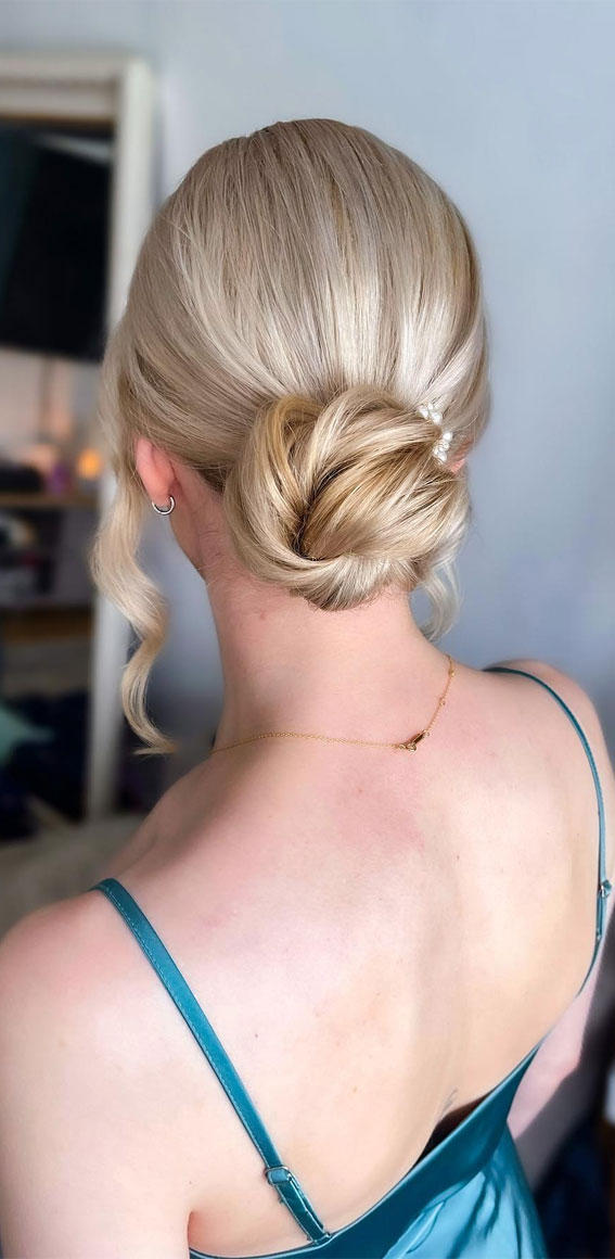 Elevate Your Look with Chic Hairstyling Ideas : Modern Chic Low Bun