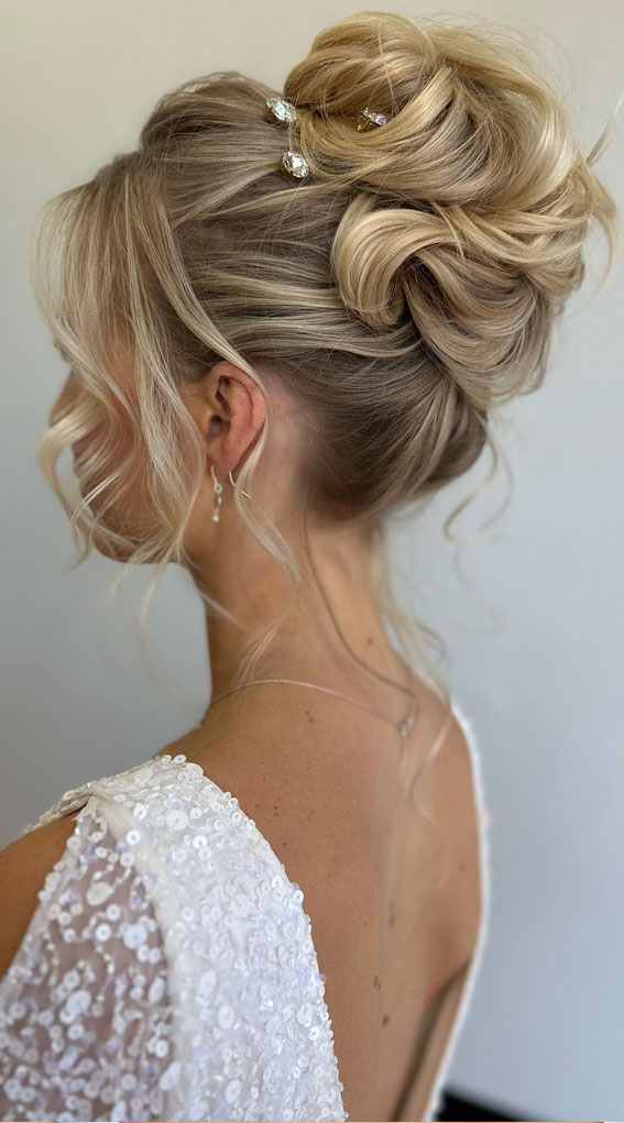 Elevate Your Look With Chic Hairstyling Ideas : Effortless Top Bun