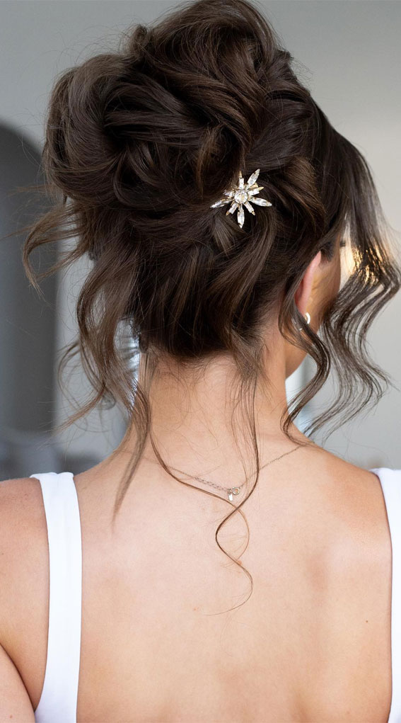 Elevate Your Look With Chic Hairstyling Ideas : Brunette Glam High Messy Bun