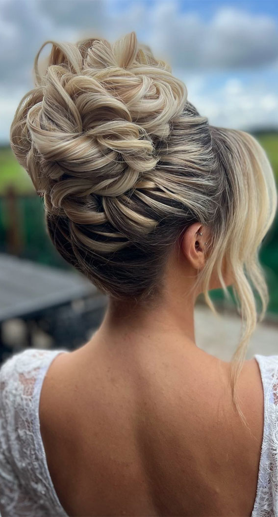 Elevate Your Look With Chic Hairstyling Ideas : Textured Elegance with High Updo