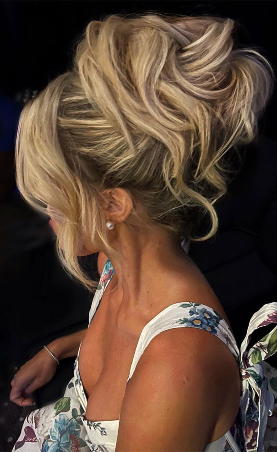 Elevate Your Look With Chic Hairstyling Ideas : Voluminous High Big Bun