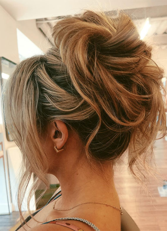 Elevate Your Look With Chic Hairstyling Ideas : Messy Knot High Bun