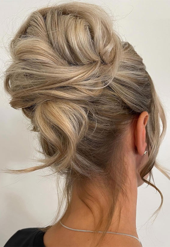 Elevate Your Look With Chic Hairstyling Ideas : Pretty Twisted Roll Upstyle