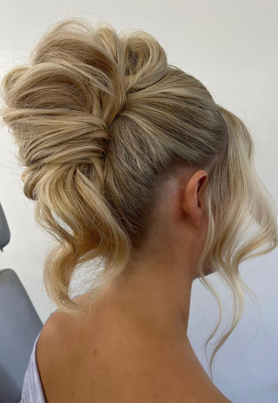 Elevate Your Look With Chic Hairstyling Ideas : Charm Twisted Rolls Upstyle