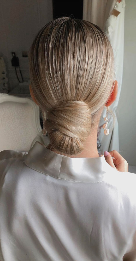 Elevate Your Look with Chic Hairstyling Ideas : Classic & Elegance Chignon