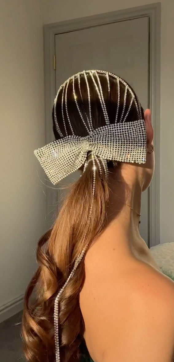 A Trendy Collection of Hairstyles Adorned with Chic Bows : Glam Oversized Diamante Bow Ponytail