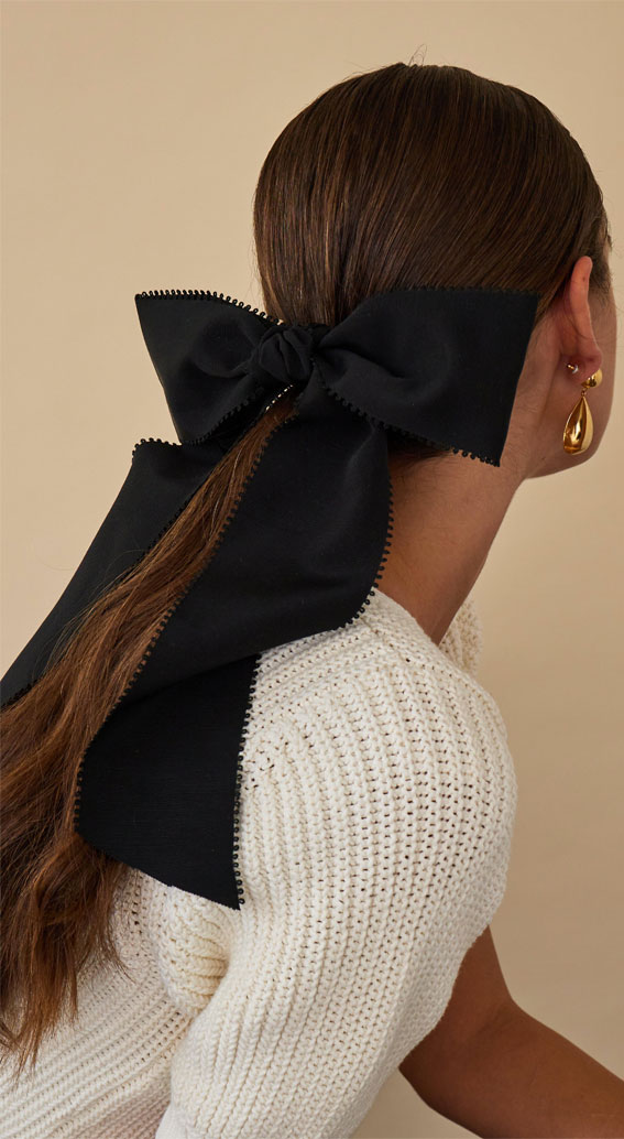 A Trendy Collection of Hairstyles Adorned with Chic Bows : Ponytail with Oversized Scallop Bow