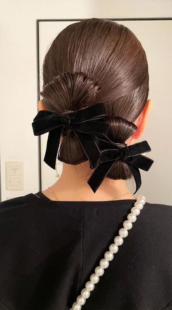 A Trendy Collection of Hairstyles Adorned with Chic Bows : Double Bow Buns with Bows