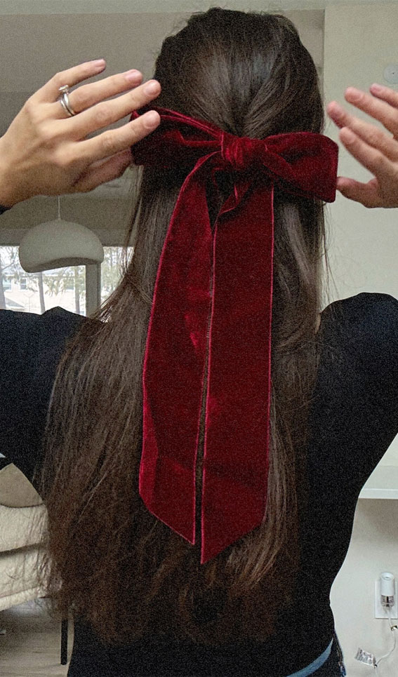 A Trendy Collection of Hairstyles Adorned with Chic Bows : Brunette Half Up with Red Bow