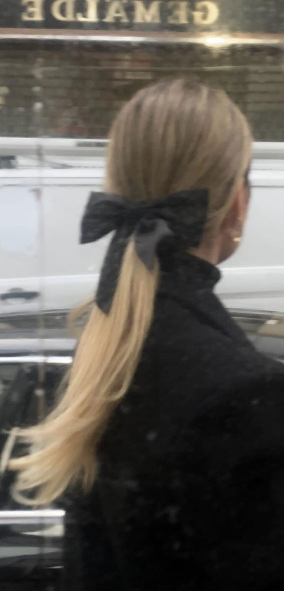 A Trendy Collection of Hairstyles Adorned with Chic Bows : Trendy Black Bow on Ponytail