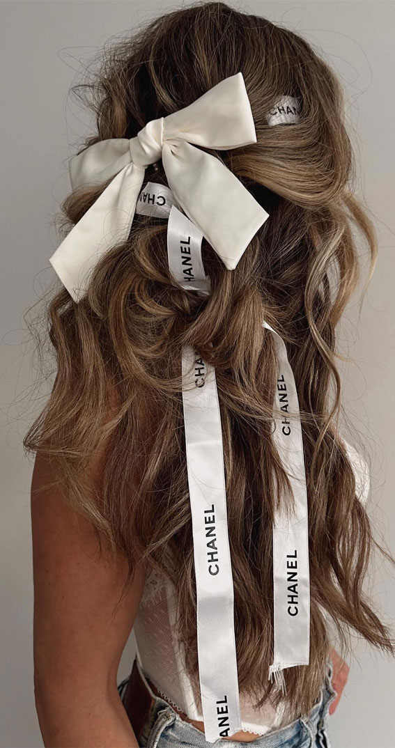 A Trendy Collection of Hairstyles Adorned with Chic Bows : Chanel Creamy White Bow
