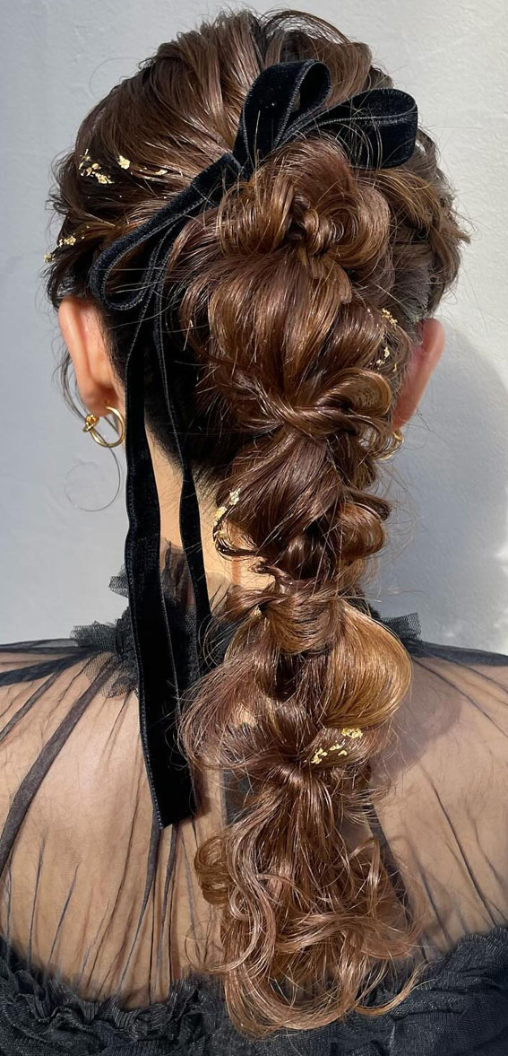 A Trendy Collection of Hairstyles Adorned with Chic Bows : Messy Bubble Braid Pony with Bow
