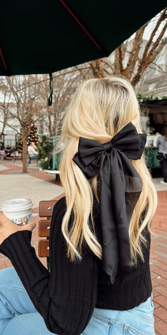 A Trendy Collection of Hairstyles Adorned with Chic Bows : Blonde Simple Half Up with Black Bow