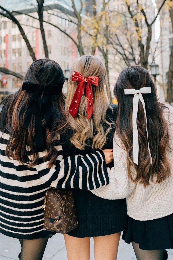 A Trendy Collection of Hairstyles Adorned with Chic Bows : Half Up with Black, Red & White Bows