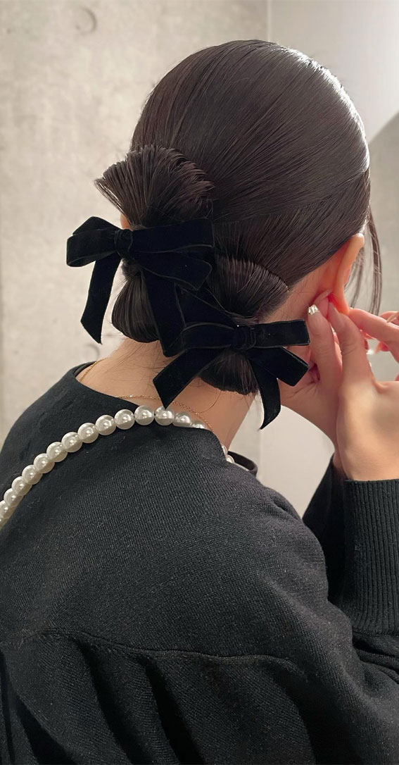 A Trendy Collection of Hairstyles Adorned with Chic Bows : Bow Knotted Buns with Bows