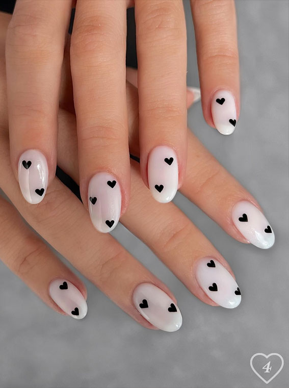 30+ Love-Inspired Nail Aesthetics : Milky White Nails with Black Hearts