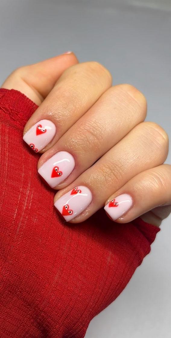 Valentine's Day nails, Romantic nail designs, Love-themed nail art, Heart-shaped nail patterns, Cupid-inspired nail ideas, Red and pink Valentine nails, Date night manicure, Valentine's Day acrylic nails, Romantic nail color trends, Love letter nail art, Heartfelt Valentine's nails, Sweetheart nail designs, Couples manicure ideas, Valentine's Day beauty trends, Love-inspired nail aesthetics