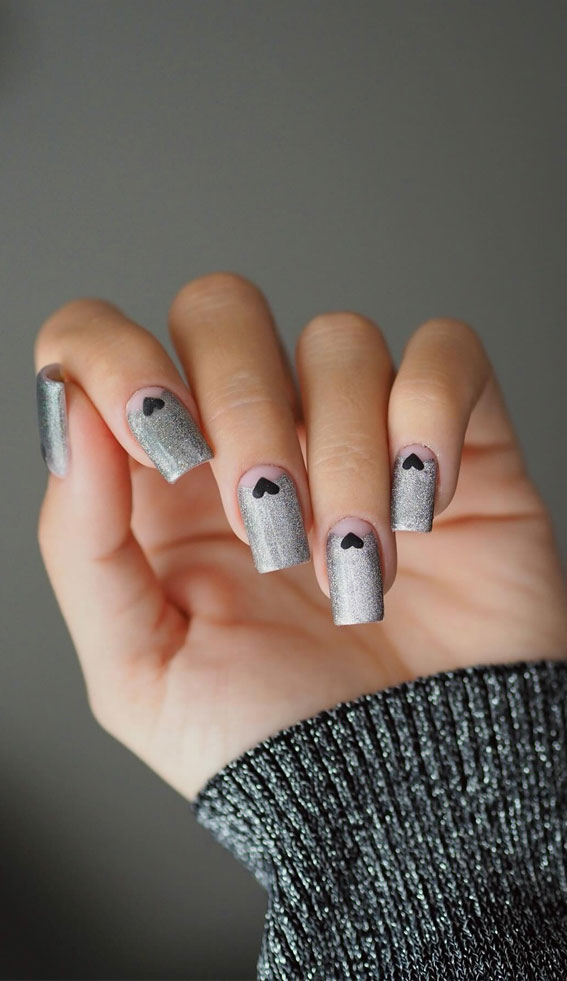 30+ Love-Inspired Nail Aesthetics : Shimmery Silver Nails with Black Hearts