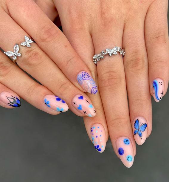 blue nails, butterfly blue nails, blue nail designs, blue nail art, blue nail ideas, mismatched blue nails, short blue nails, simple blue nails, almond blue nails