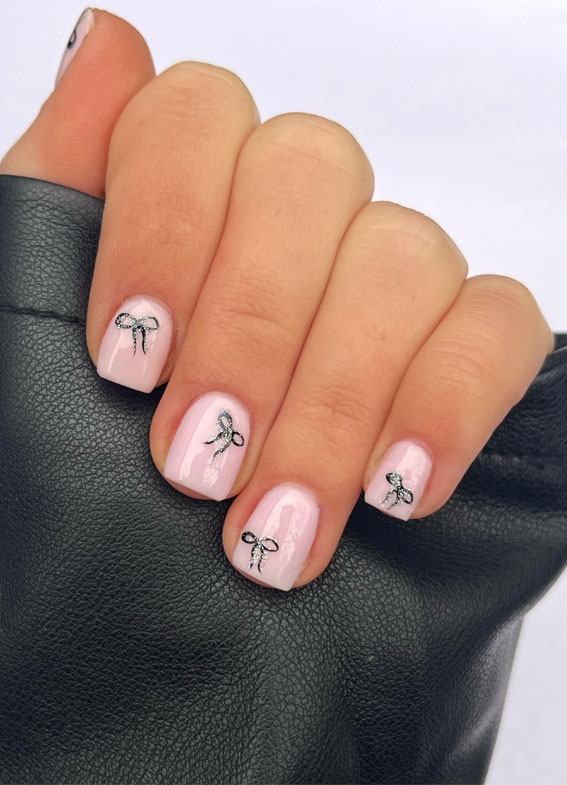 Unleash Your Style with These 40 Cute Nail Ideas : Tiny Black Bow Ribbon on Natural Short Nails