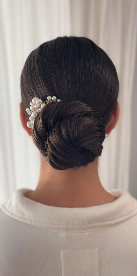 Hairdos to Steal the Spotlight on Every Special Occasion : Simple Low Updo with Pearl Hair Clip