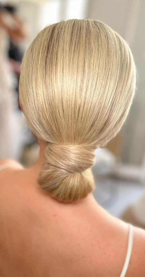 Hairdos to Steal the Spotlight on Every Special Occasion : Honey Blonde Smooth Twisted Low Bun