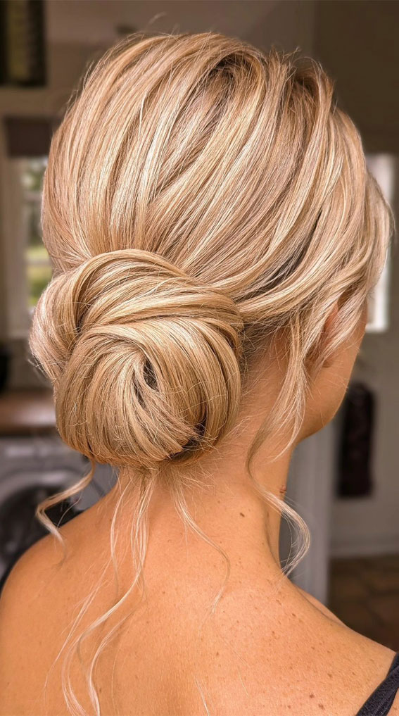 Hairdos to Steal the Spotlight on Every Special Occasion : Simple Knott Bun with Boho Vibe